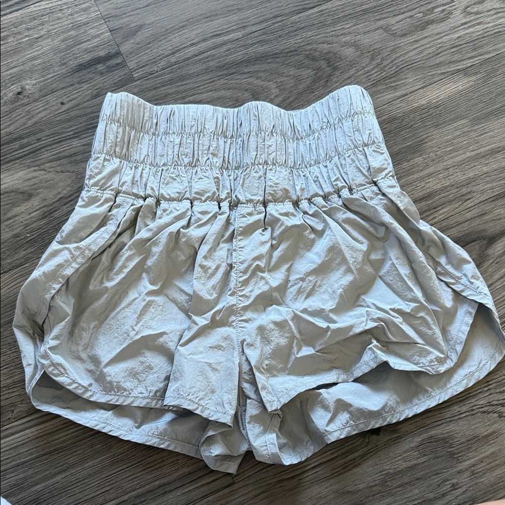 Free people High-Rise Smocked Athletic Shorts in Light Beige